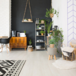 A living room with black and white walls and a black and white rug | Landisa home state