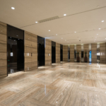 A marble floor in an elevator lobby | luxury flats