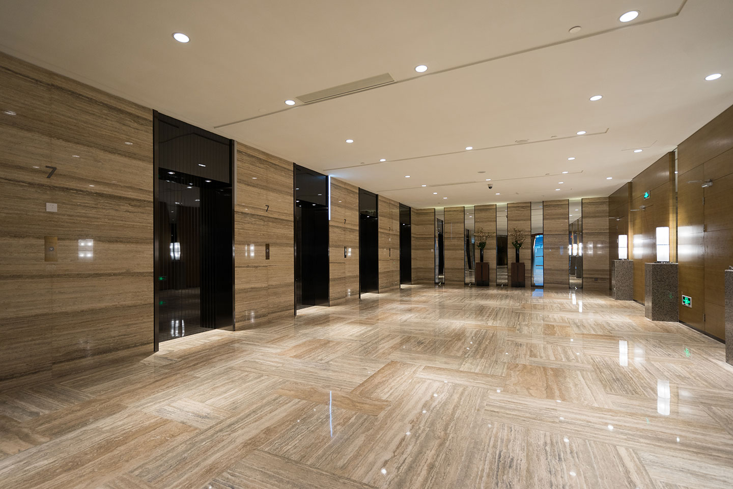 A marble floor in an elevator lobby | luxury flats